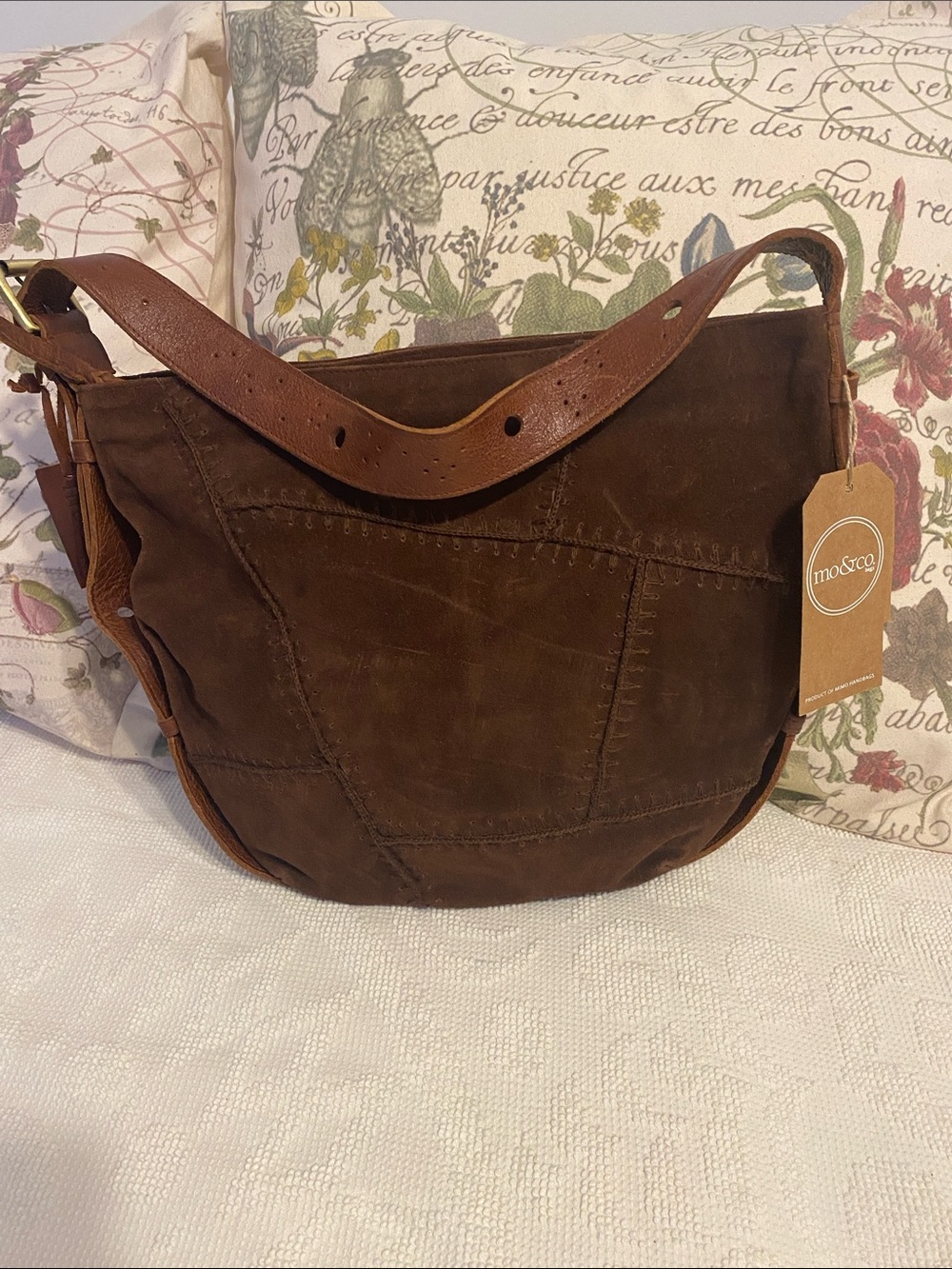 MO & CO. Large Shoulder bag .  Suede Leather and the handle is leather